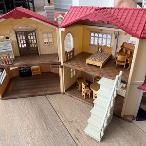 Calico Critters village. Like new! Save this Christmas!! Selling as a set